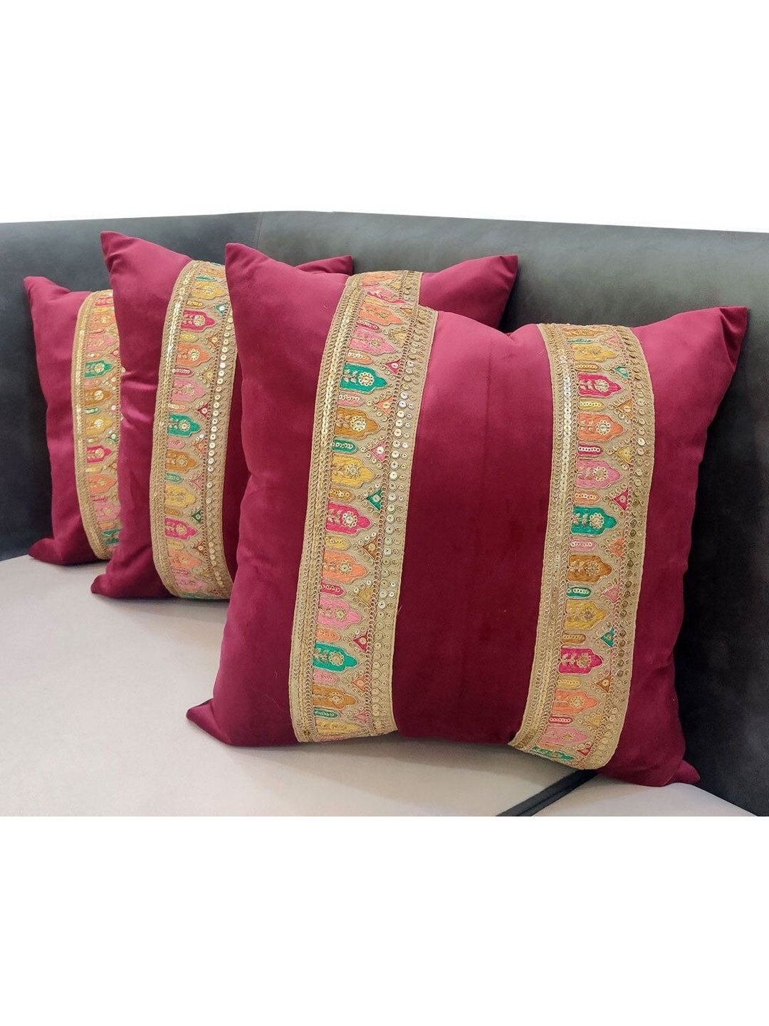 

Good Vibes Maroon & Gold-Toned 3 Pieces Embellished Velvet Square Cushion Covers