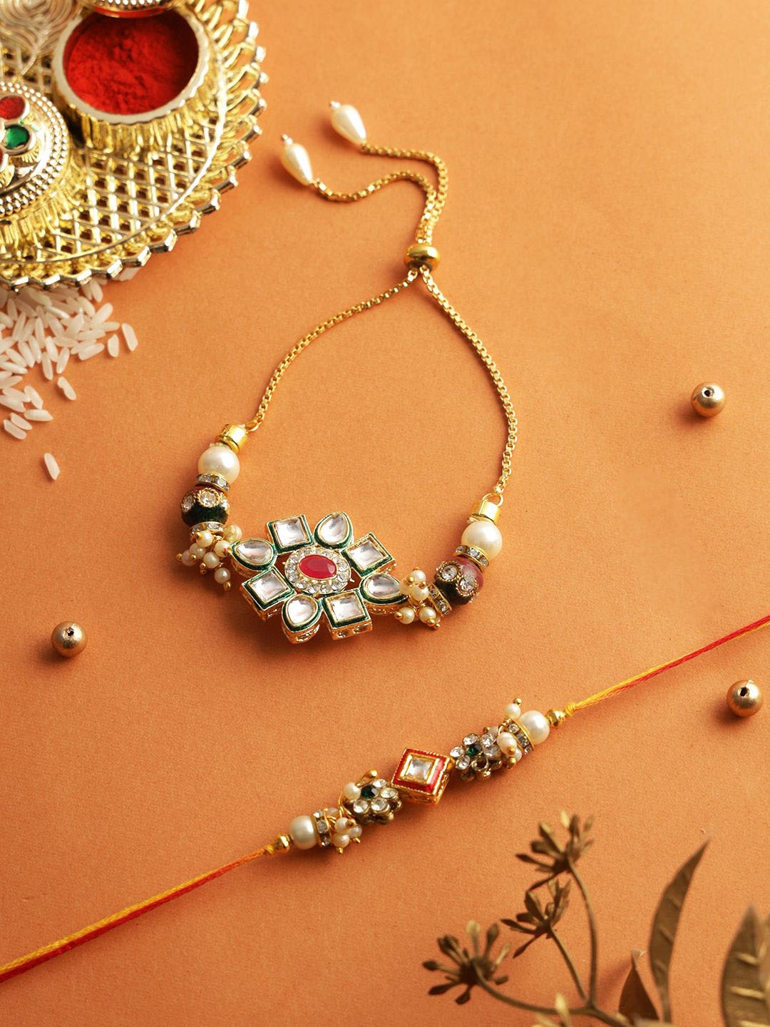 

Aapno Rajasthan Kundan Studded Faux Pearls Beaded Bhaiya Bhabhi Thread Rakhi, Gold
