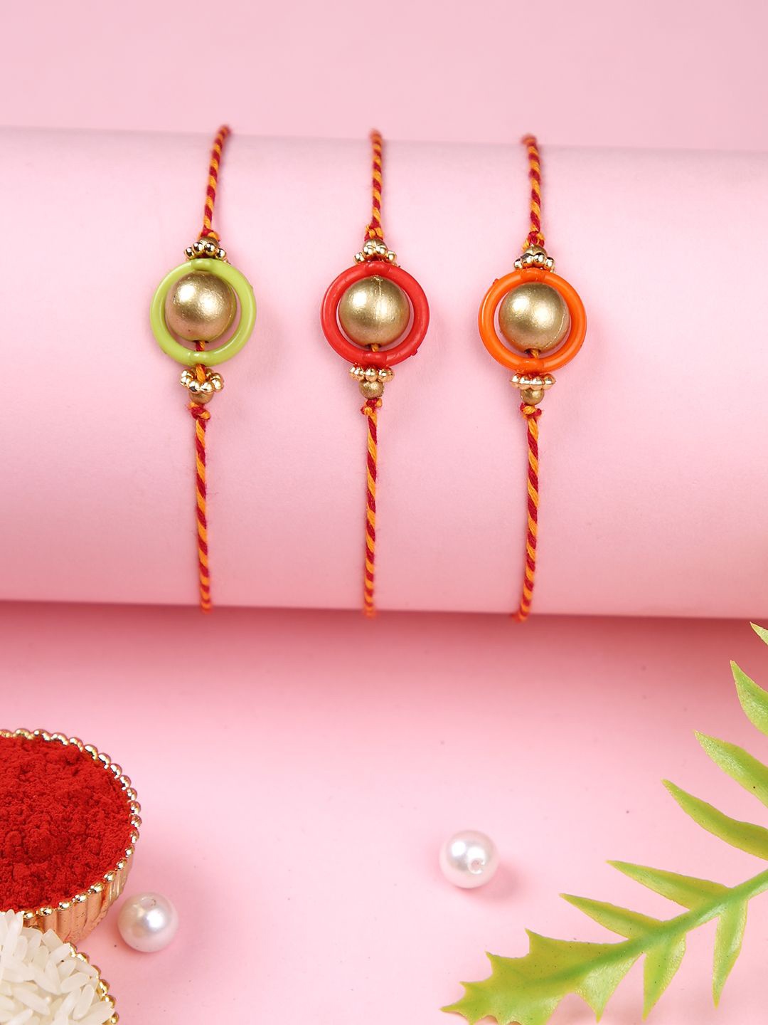 

Aapno Rajasthan Set of 3 Beaded Rakhi With Roli Chawal & Greeting Card, Gold