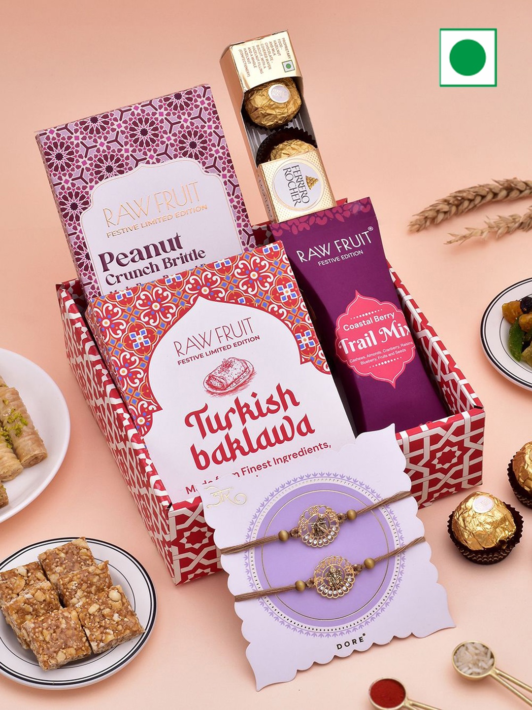 

RawFruit Hamper Tray Dry Fruit, Chocolate, Peanut Brittle With 2 Rakhi, Red
