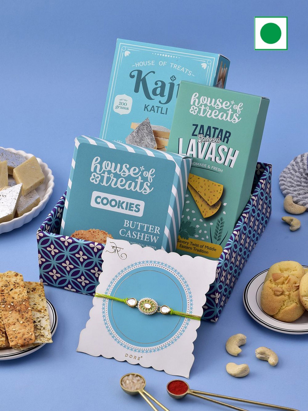 

RawFruit Rakhi Festive Hamper: Sweet, Cookies with 1 Rakhi, Blue
