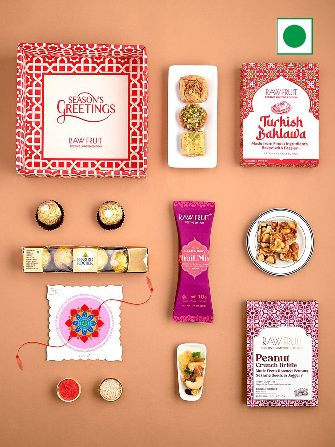 

RawFruit Set Of 4 Tray Dry Fruit & Chocolate & Peanut Brittle With 1 Rakhi, Red
