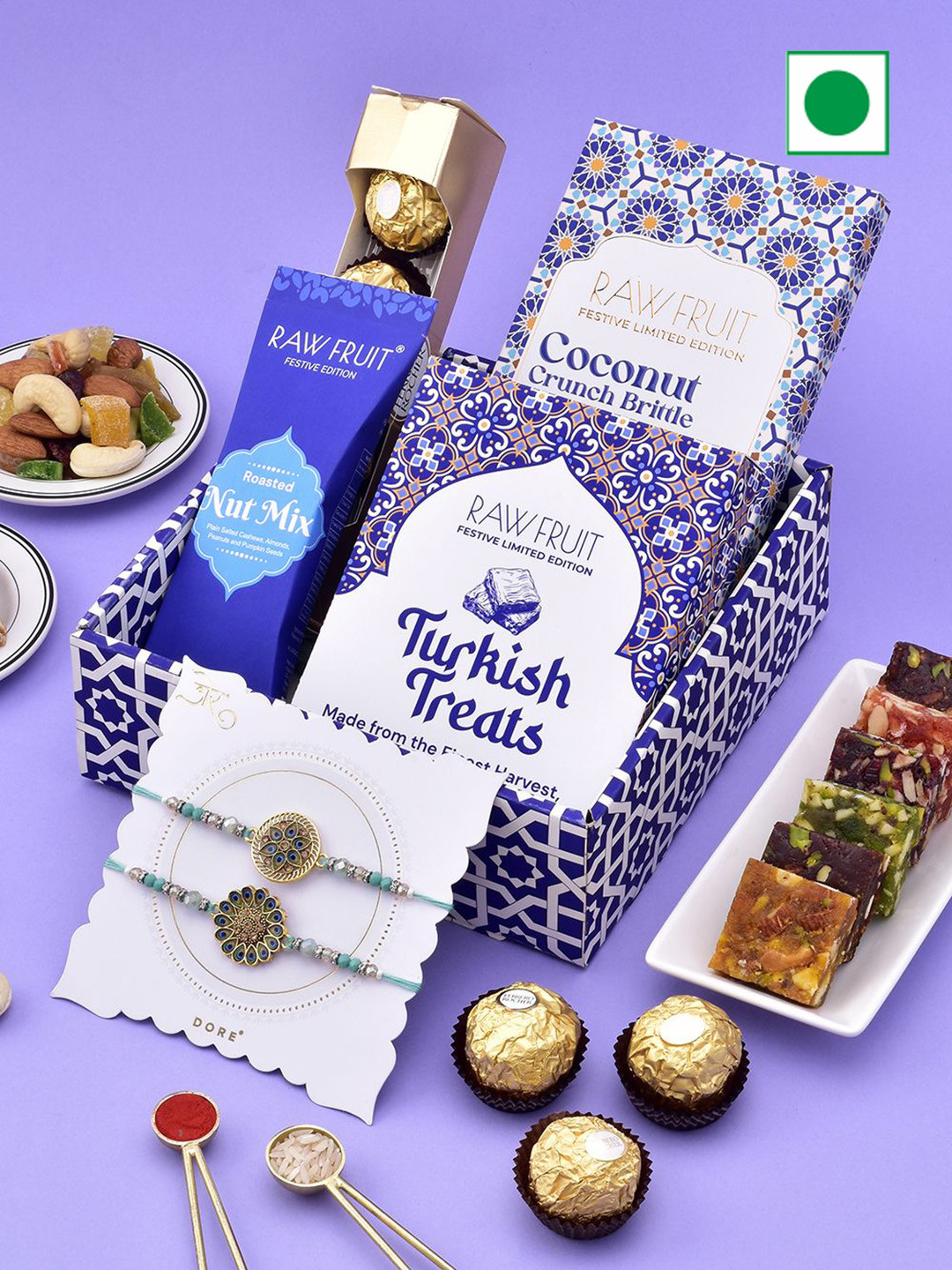 

RawFruit Rakhi Hamper: Dry Fruits, Chocolate With 2 Rakhi, Blue