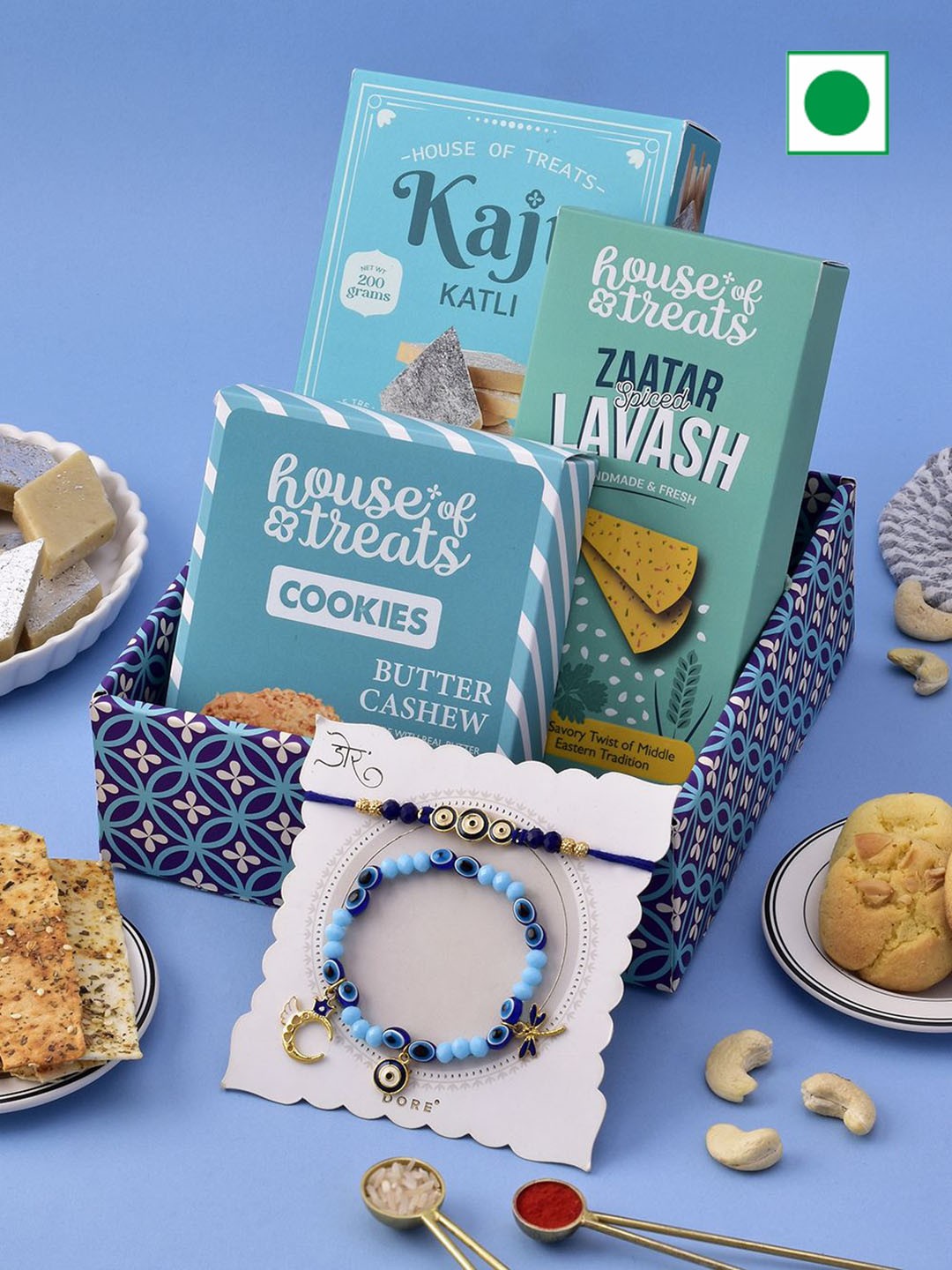 

RawFruit Rakhi Festive Hamper: Sweet, Cookies with Bhai Bhabhi Rakhi, Blue
