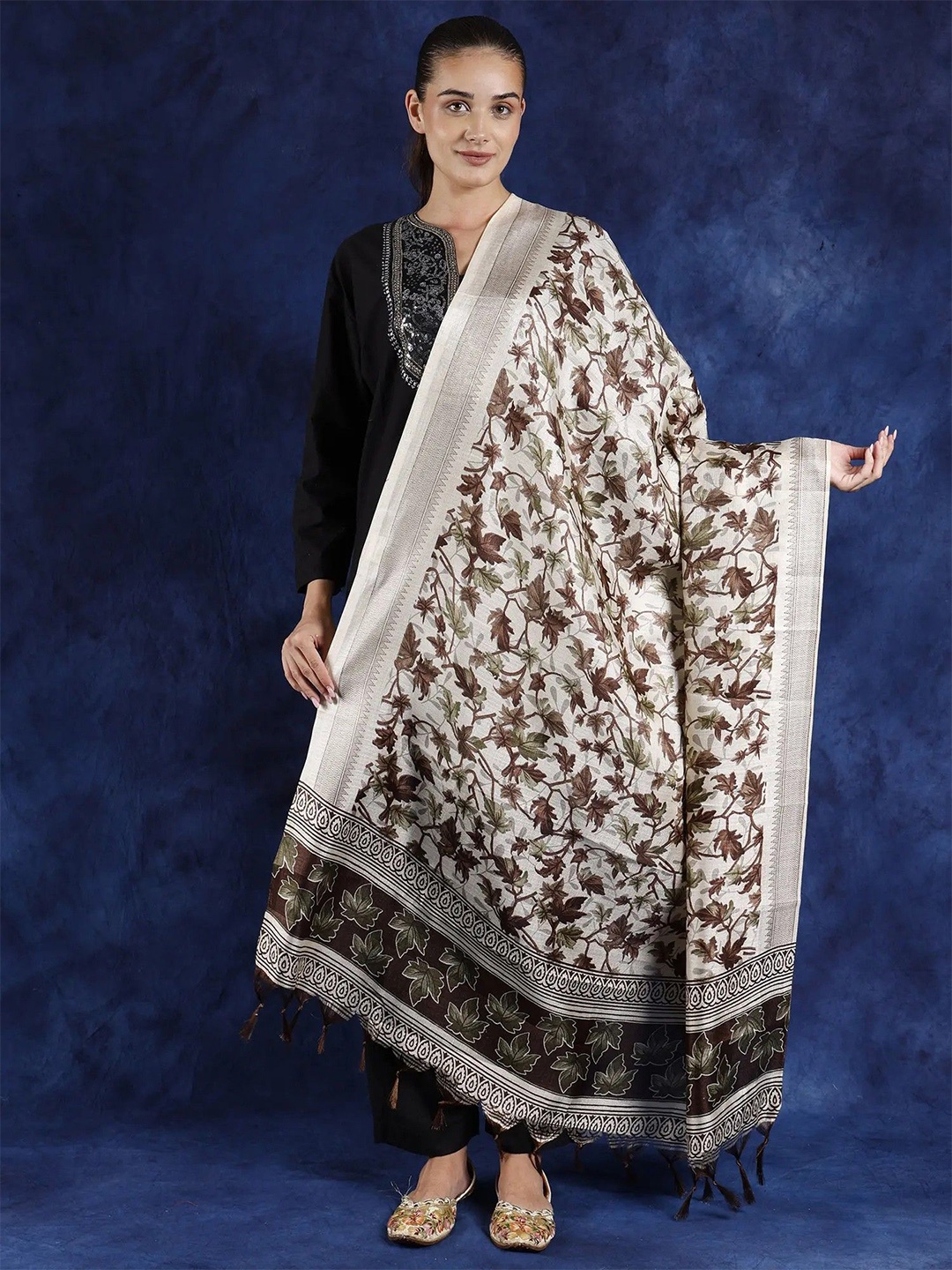 

Exotic India Carafe Color Art Silk Printed Maple Leaves Silk Dupatta with Chevron Border, Brown