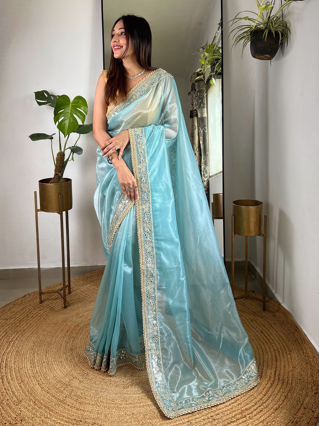 

Munir Solid Embroidered Saree, Blue