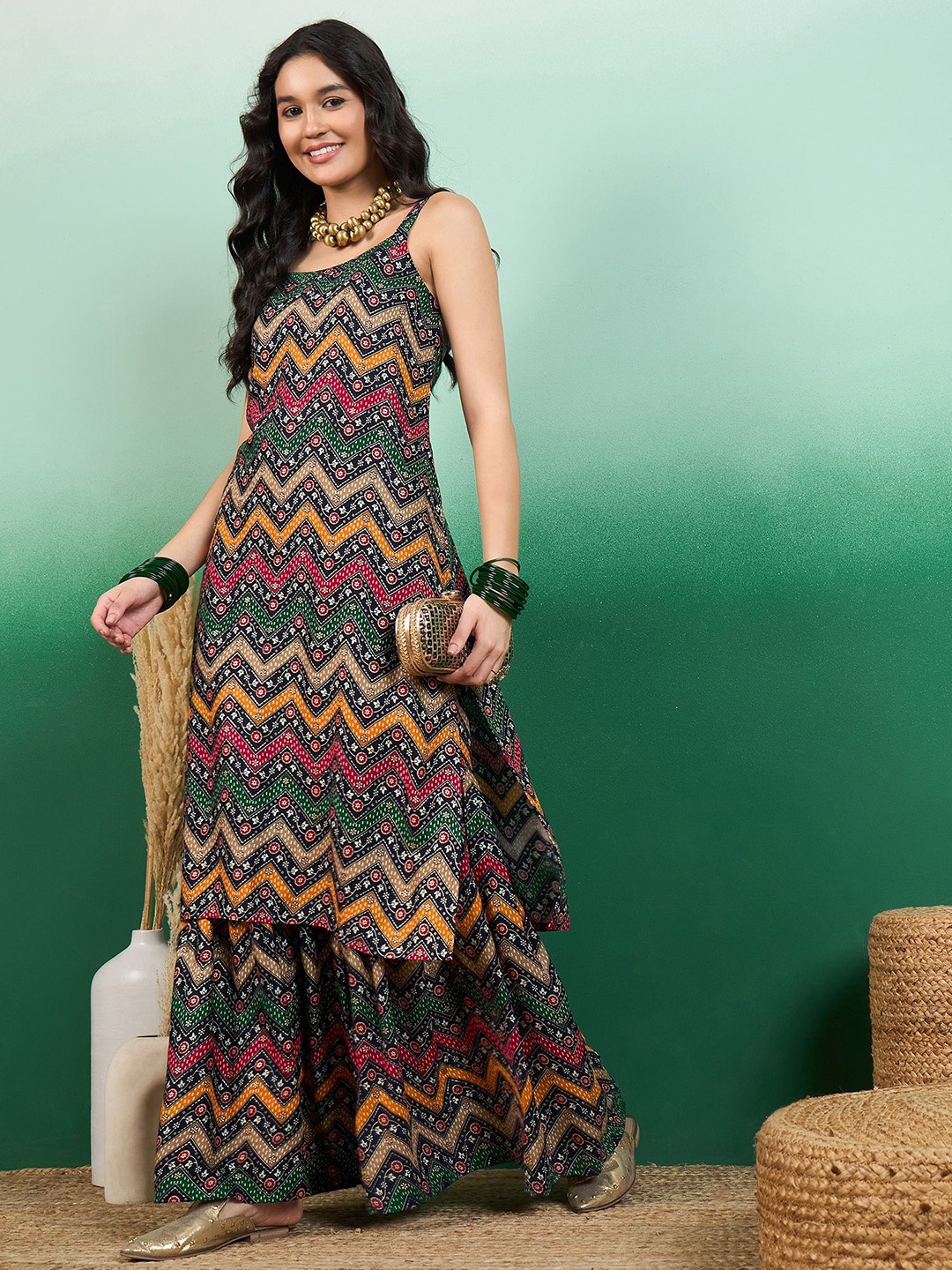 

Sangria Printed Shoulder Strap Neck Kurta & Sharara Set, Black