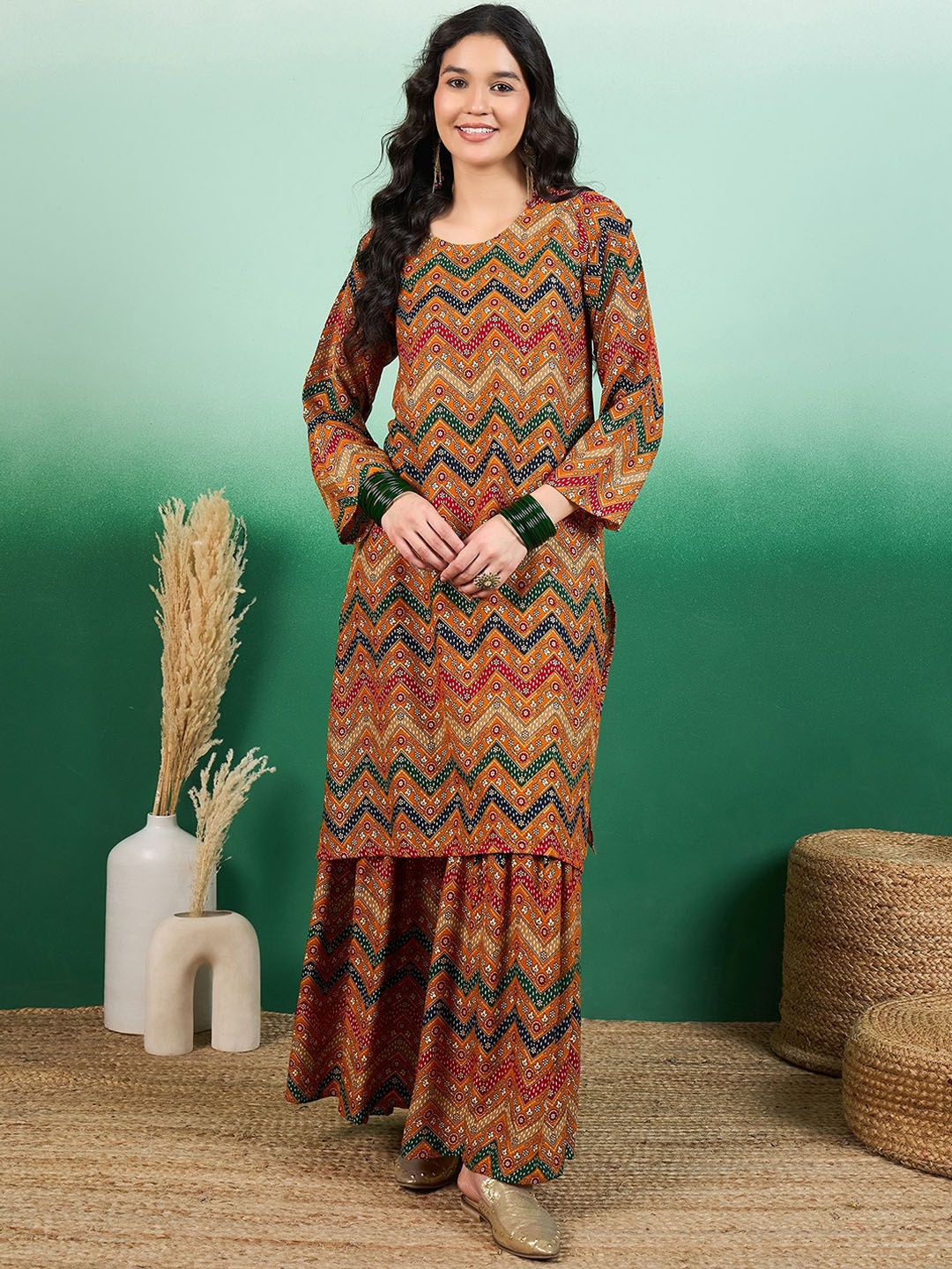 

Sangria Printed Round Neck Straight Kurta & Sahara Set, Mustard