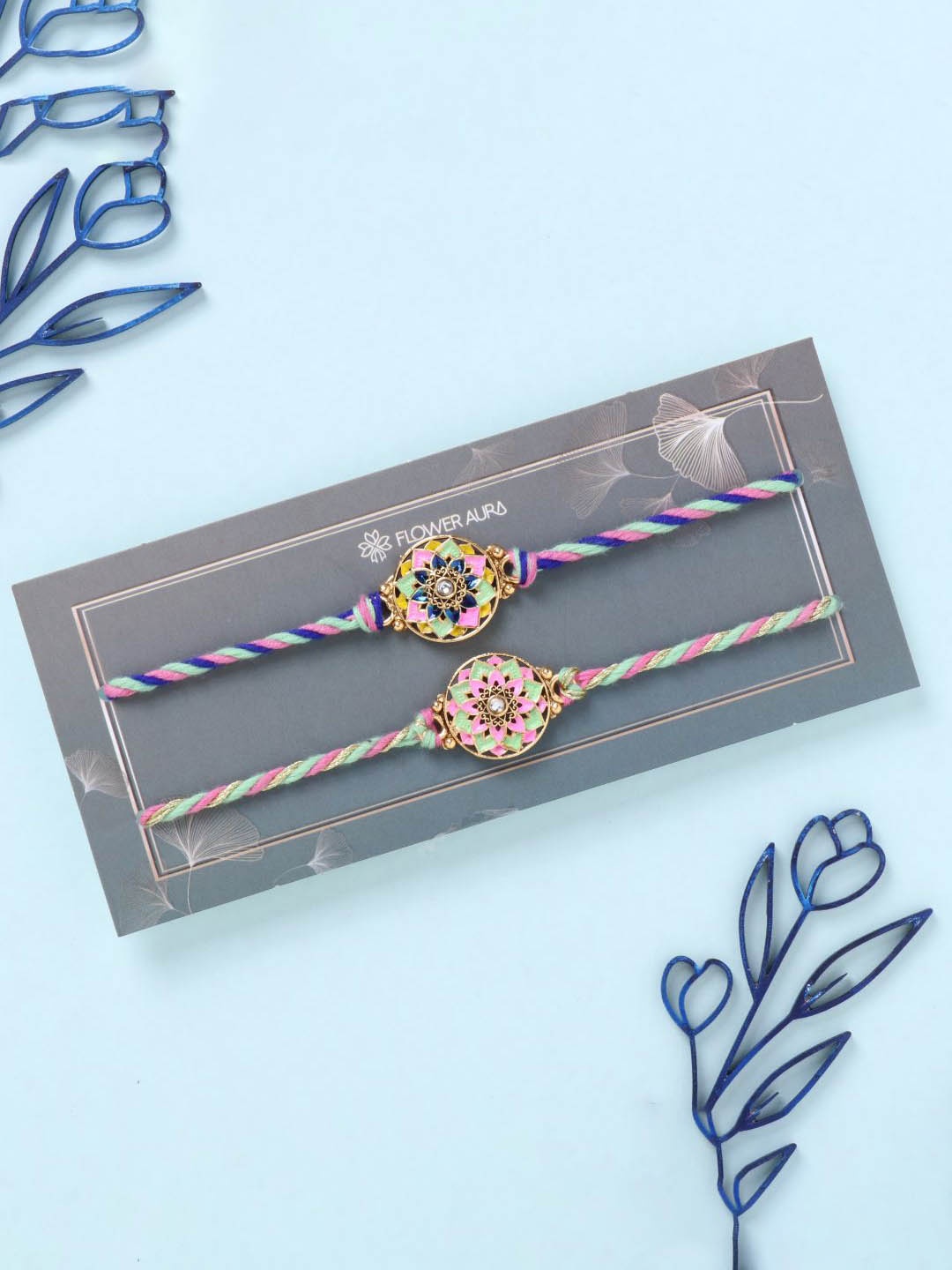 

Floweraura Set Of 2 Beaded Meenakari Thread Rakhis With Roli Chawal, Blue