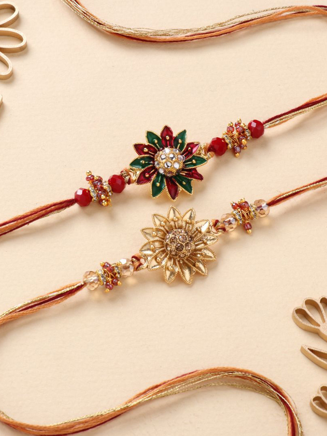 

Floweraura Set Of 2 Floral Charm Stone Studded & Beaded Thread Rakhi With Roli Chawal, Gold