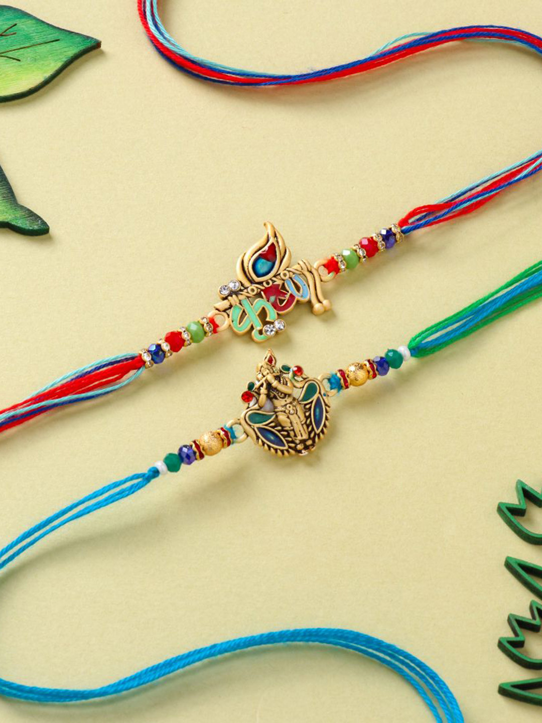 

Floweraura Set Of 2 Divine Krishna Thread Rakhis With Roli Chawal, Blue