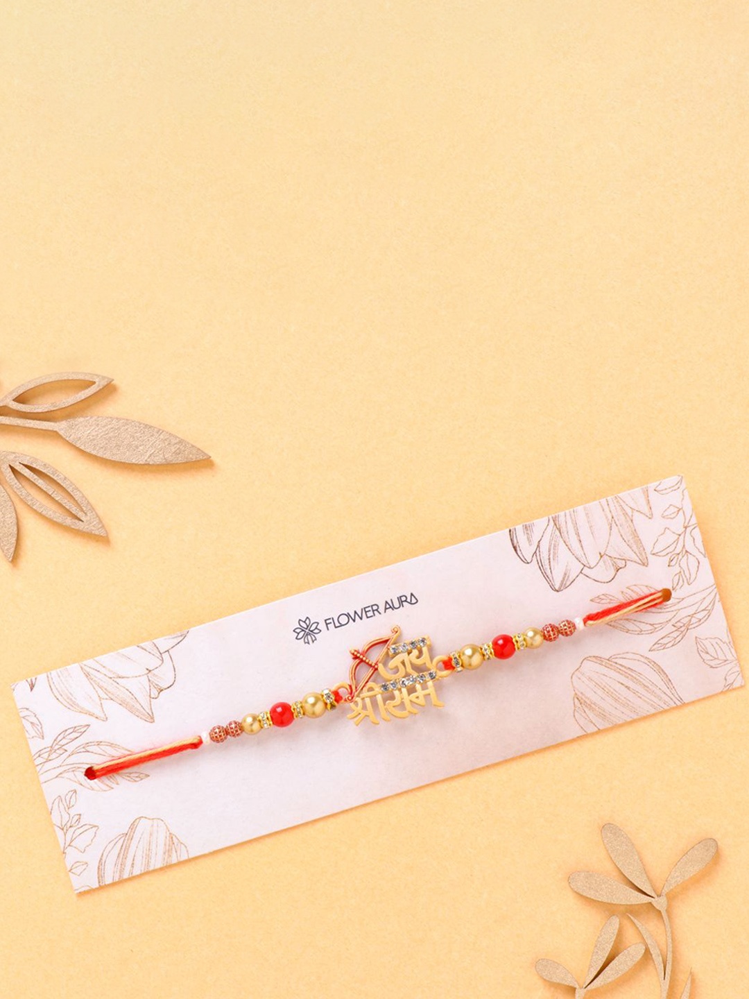 

Floweraura Jai Shree Ram Charm Thread Rakhi With Roli Chawal, Red