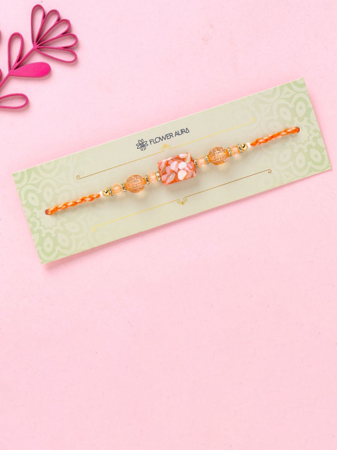 

Floweraura Crystals Stone Studded Thread Rakhi With Roli Chawal, Orange