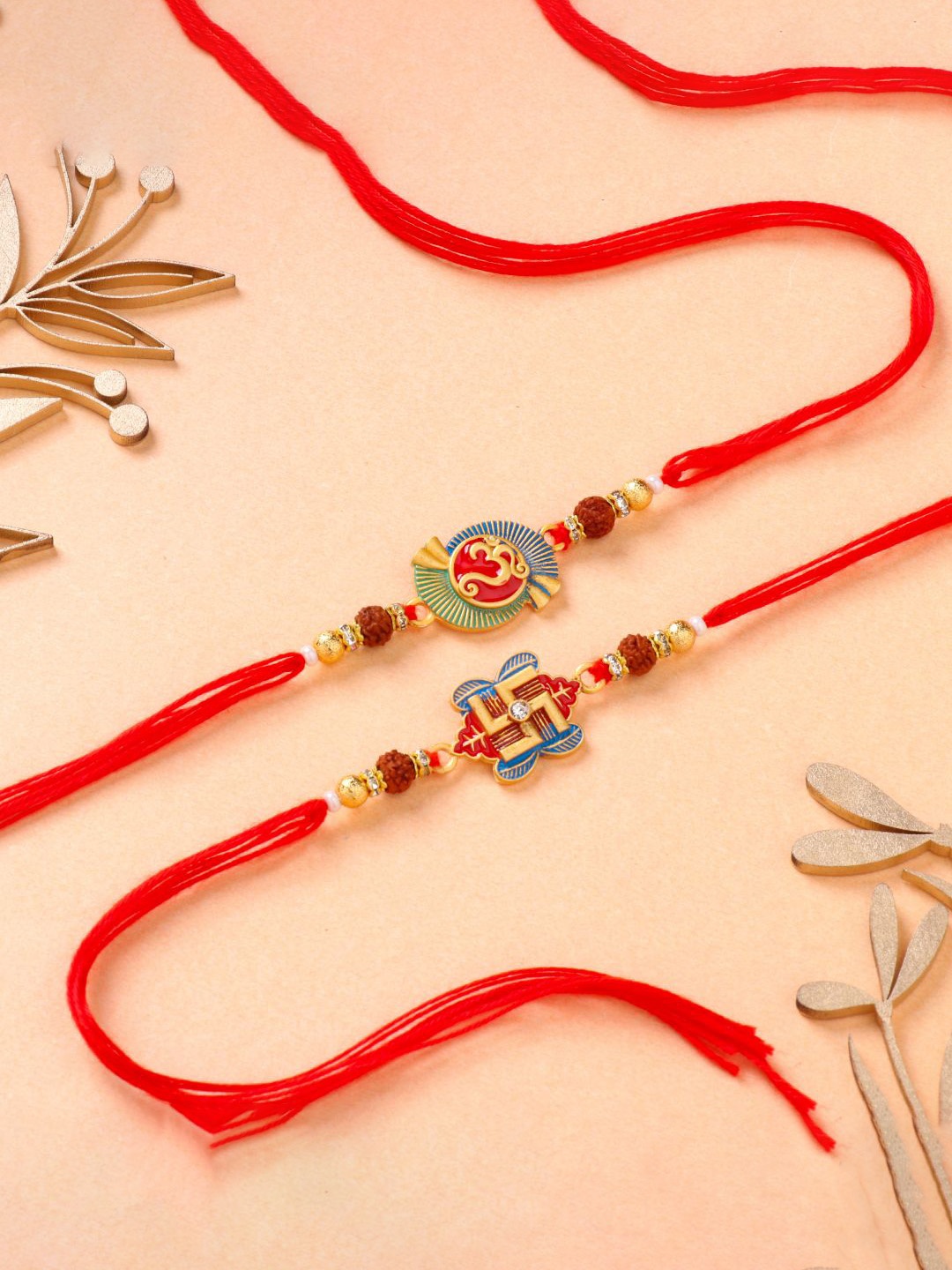 

Floweraura Set Of 2 Om and Swastik Thread Rakhis With Roli Chawal, Red