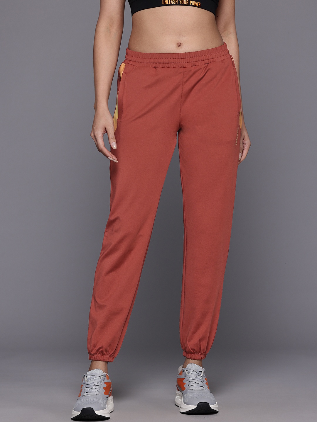 

HRX by Hrithik Roshan Women Rapid-Dry Running Joggers, Rust