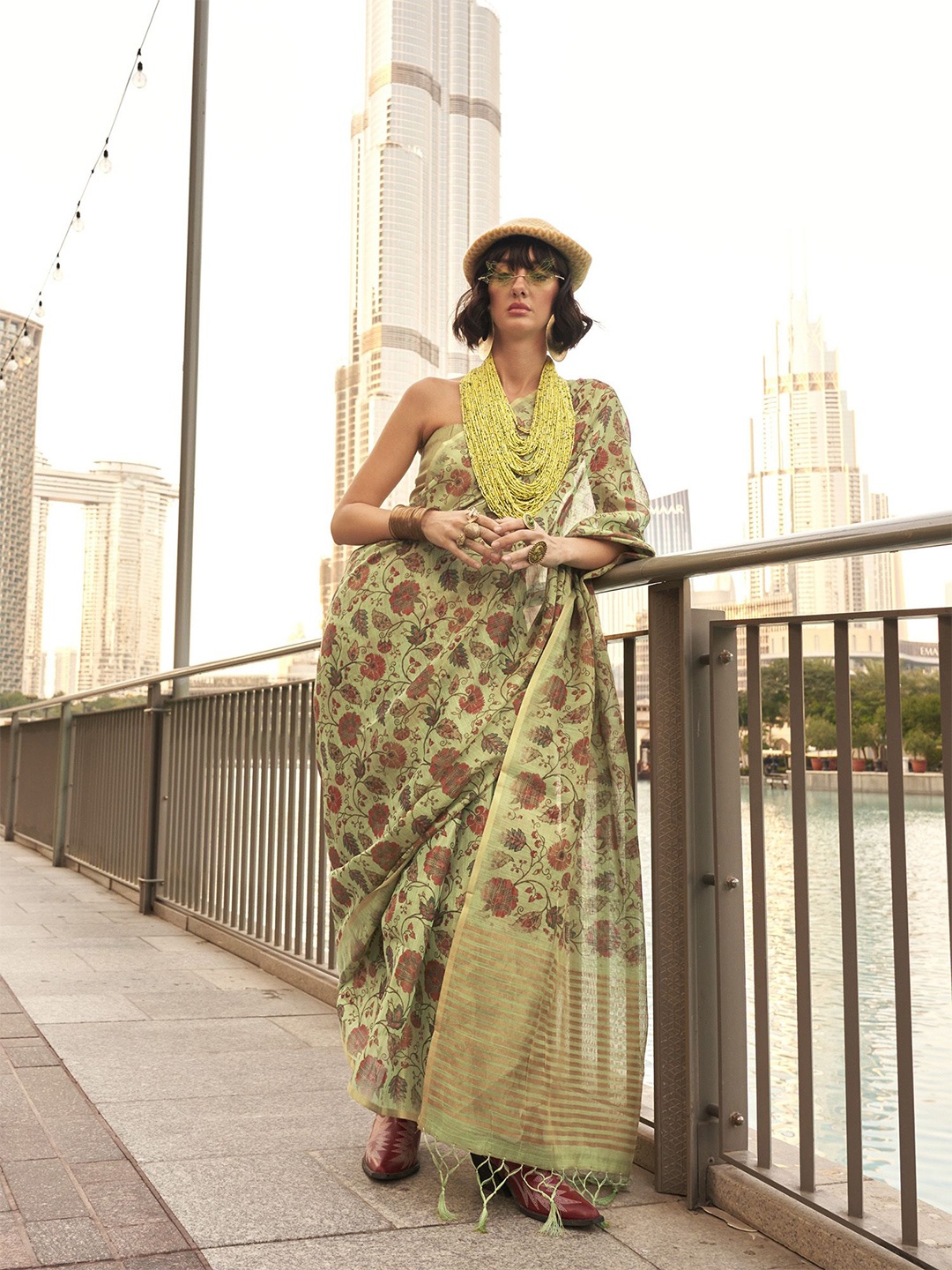 elora Ethnic Motifs Zari Woven Tassel Detail Saree, Green