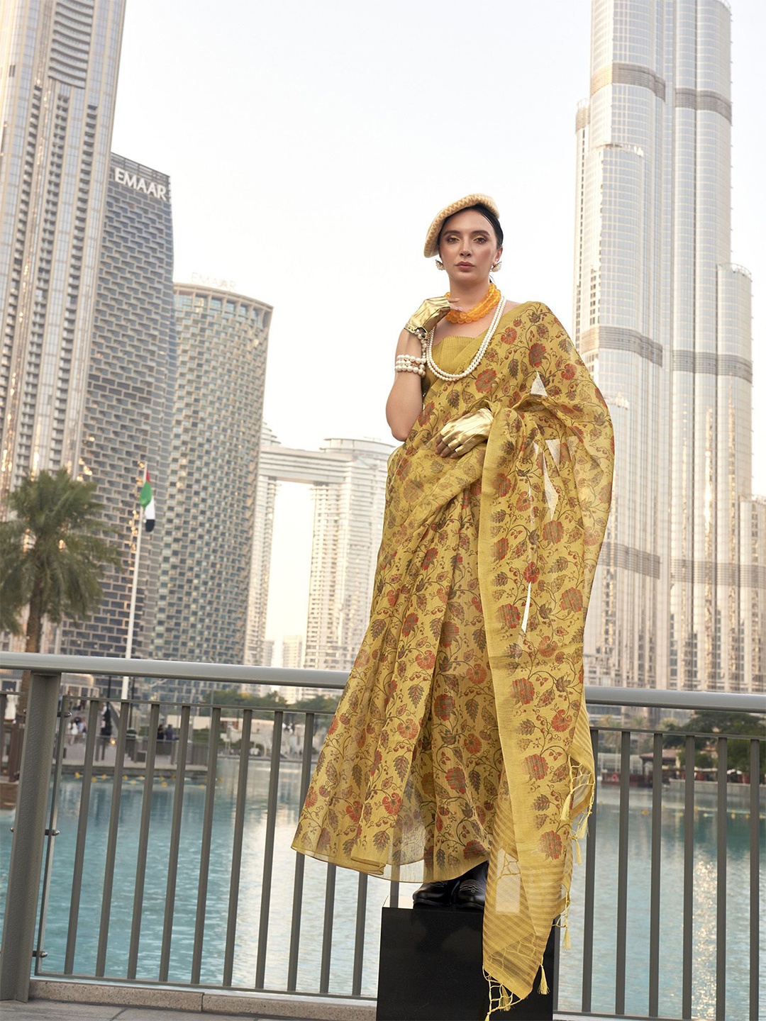 

elora Ethnic Motifs Zari Woven Tassel Detail Saree, Yellow