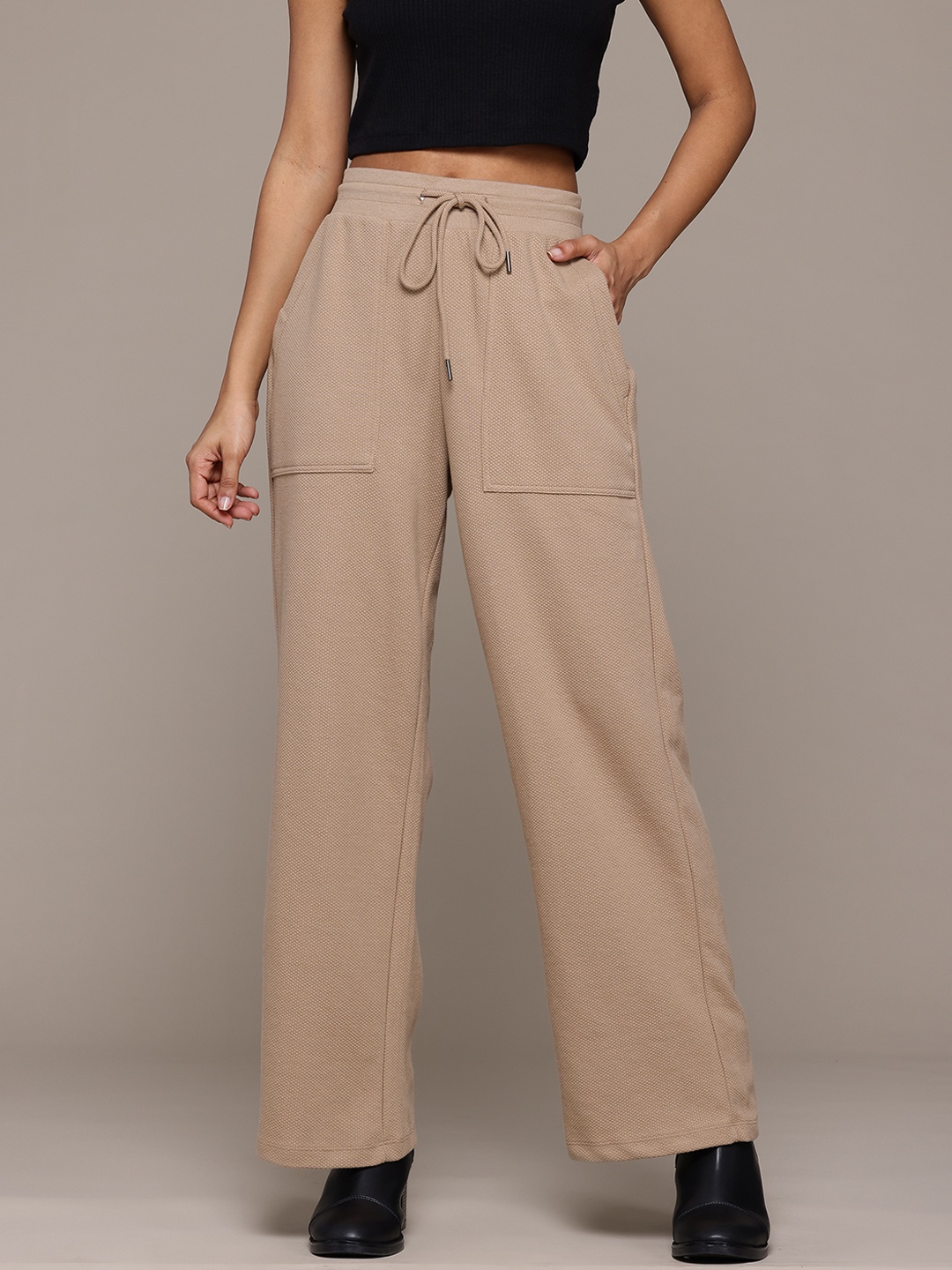 

Roadster Women Textured Trousers, Beige