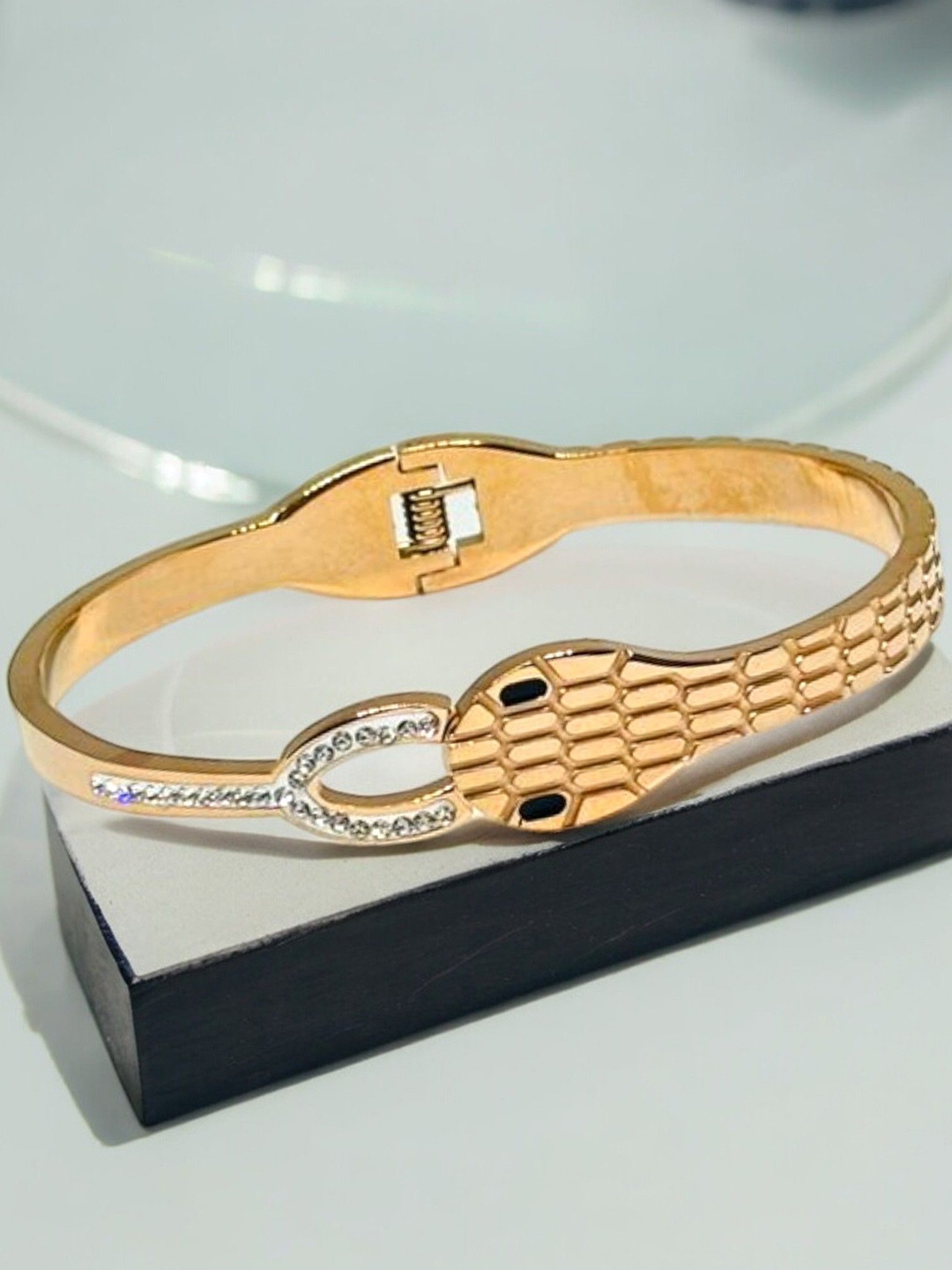 

The Pari Cubic Zirconia Rose Gold Plated Stainless Steel Bangle Style Bracelet