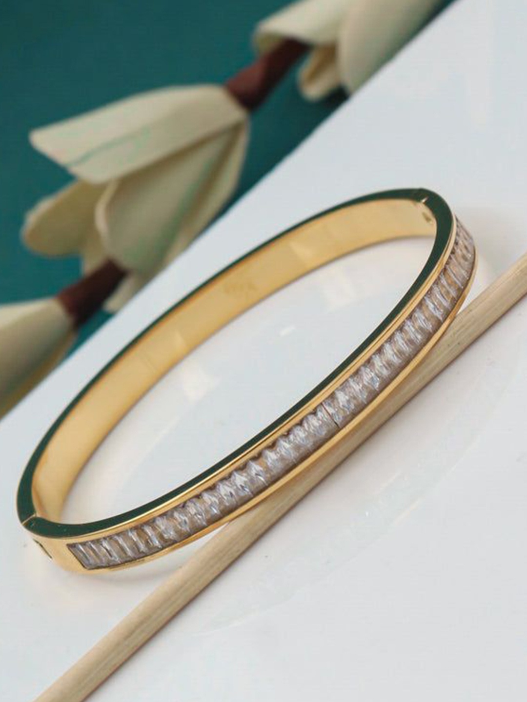 

The Pari Rose Gold-Plated Cubic Zirconia Studded Stainless Steel Bangle-Style Bracelet