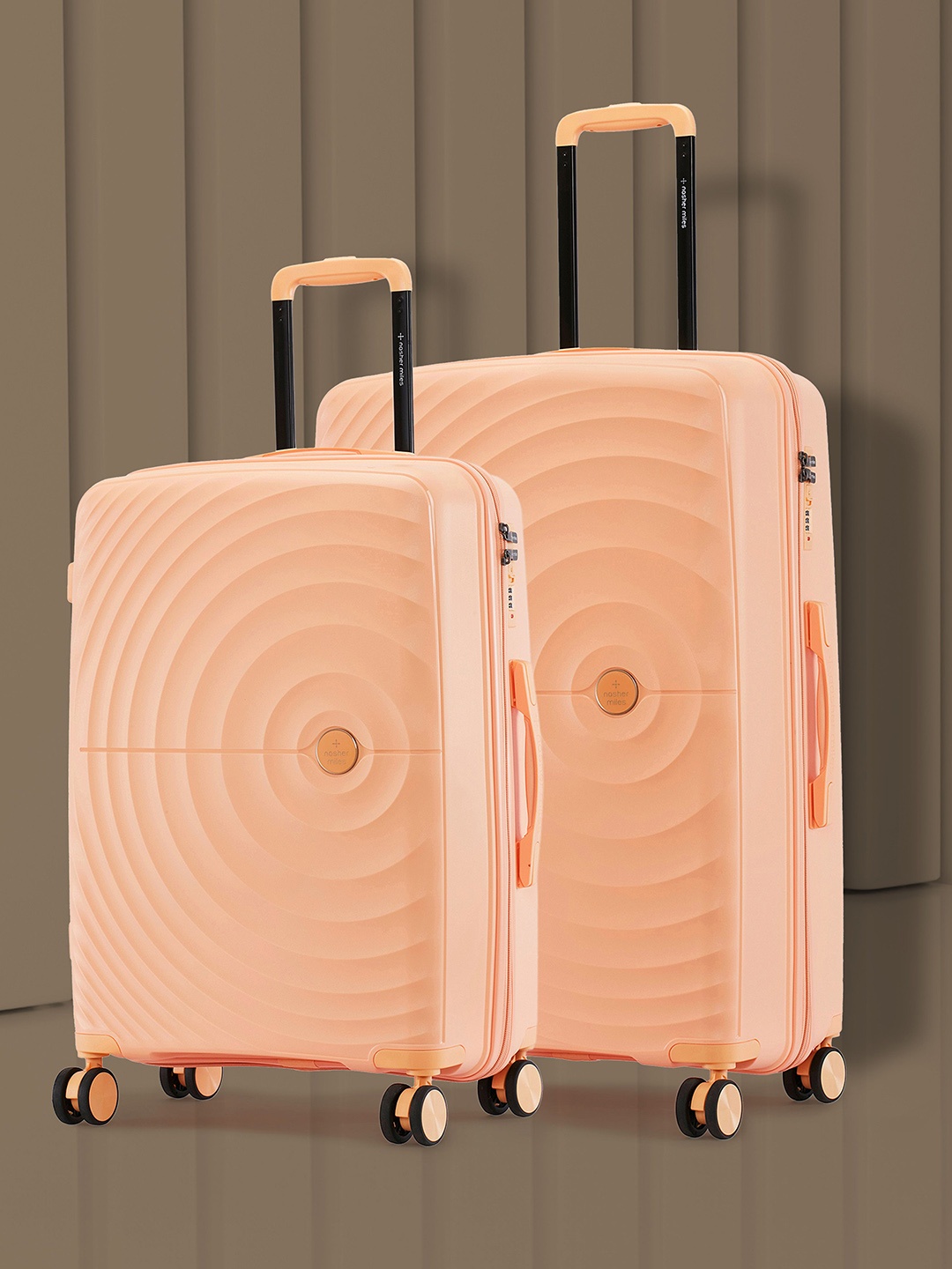 

Nasher Miles Seattle Hard-Sided Polypropylene Set of 2 M/L Peach Trolley Bags (65-75 cm)