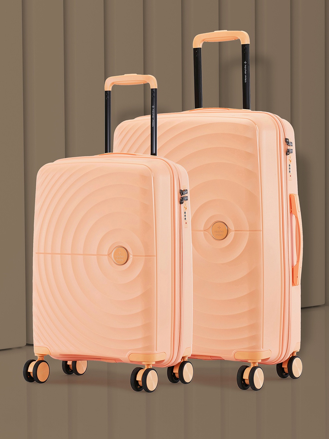 

Nasher Miles Seattle Hard-Sided Polypropylene Set of 2 S/M Peach Trolley Bags (55-65 cm)