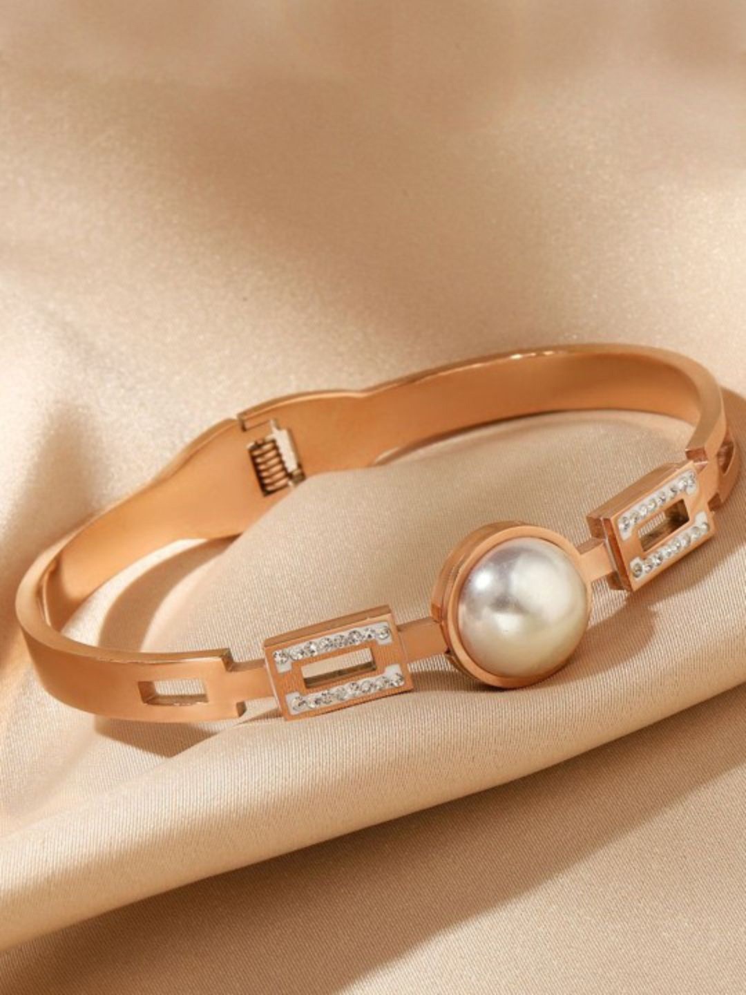 

DressBerry Rose Gold-Plated Stainless Steel American Diamond-Studded Bangle-Style Bracelet