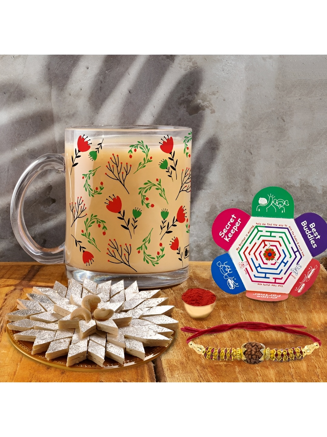 

Indigifts Set Of 3 Printed Mug Rakhi With Kaju Katli, White
