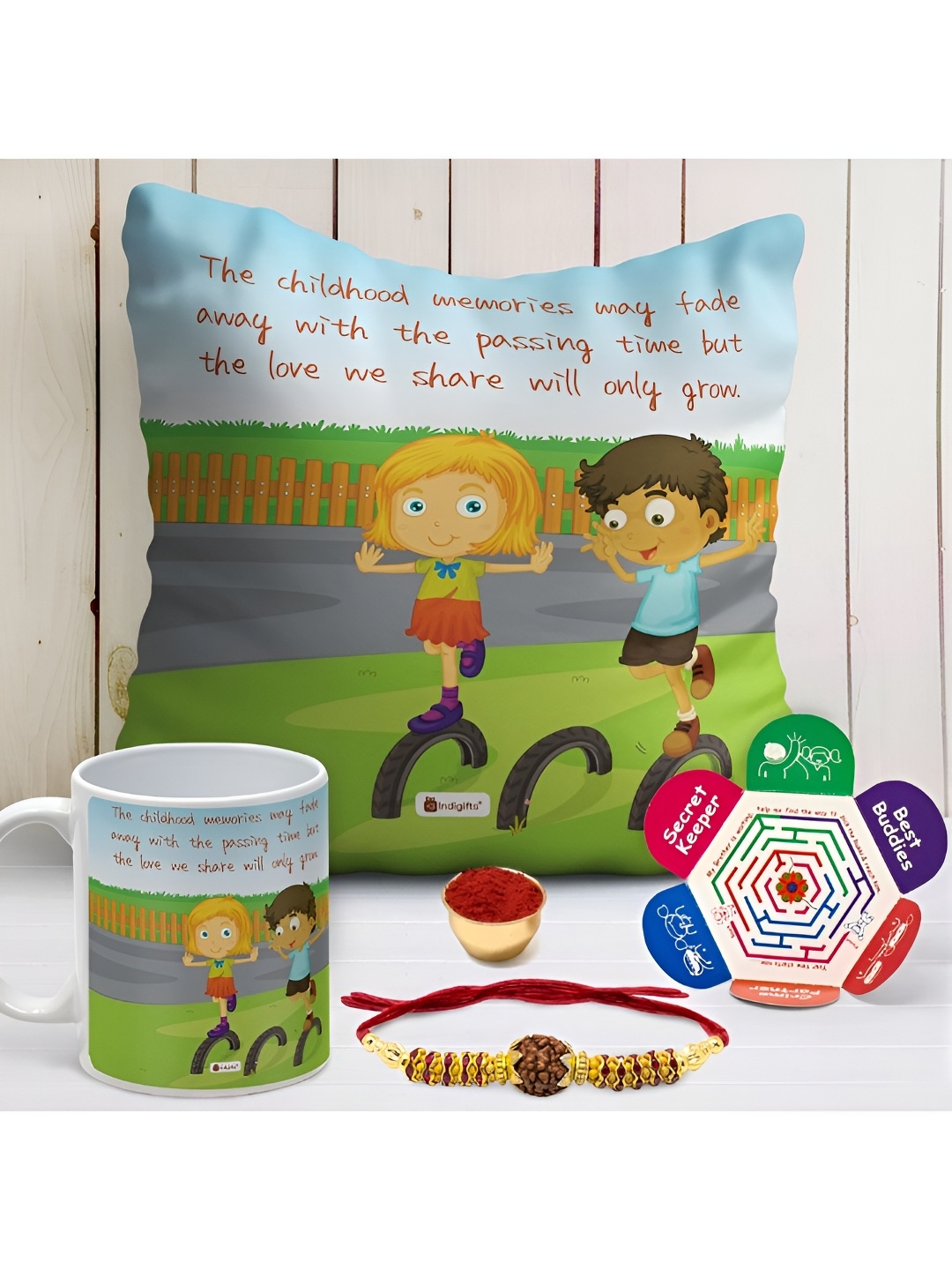 

Indigifts Rakhi With Mug & Cushion Gift Set, Blue