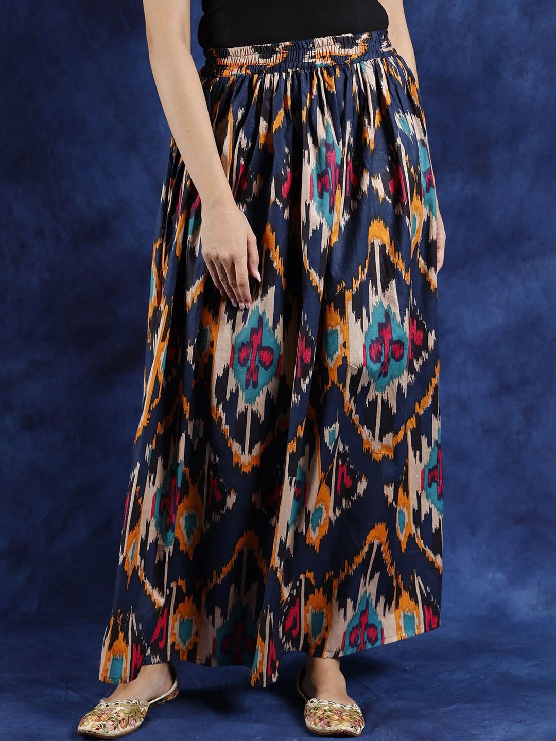 

Exotic India Printed Pure Cotton Flared Maxi Skirt, Blue