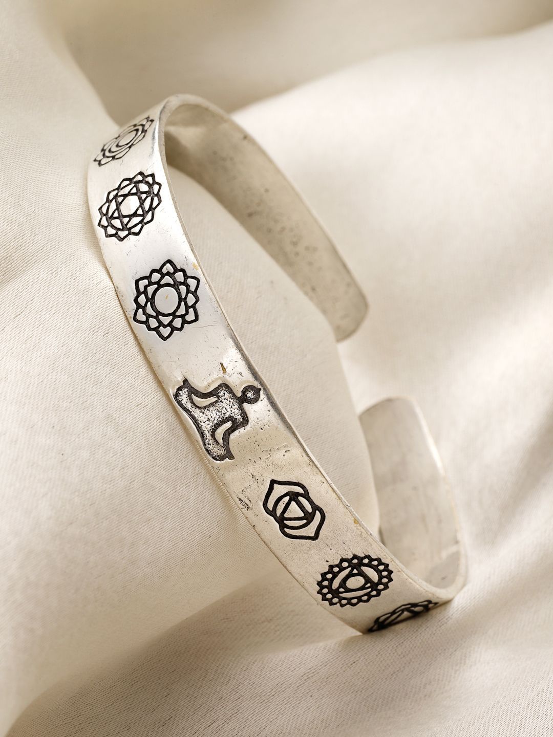 

Sanjog Silver-Plated Statement Stacking Hammered Seven Chakra Buddha Brass Bracelet