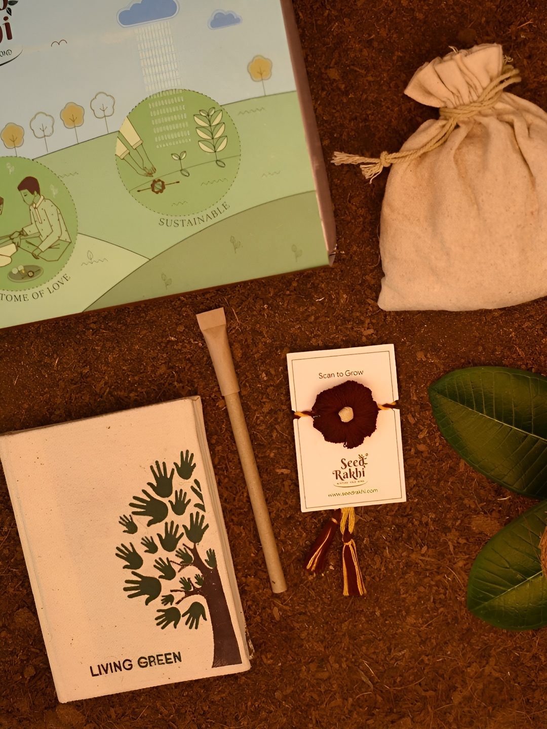 

Indigifts Seed Rakhi For Brother With Planter, 1 Diary & Pen, Red