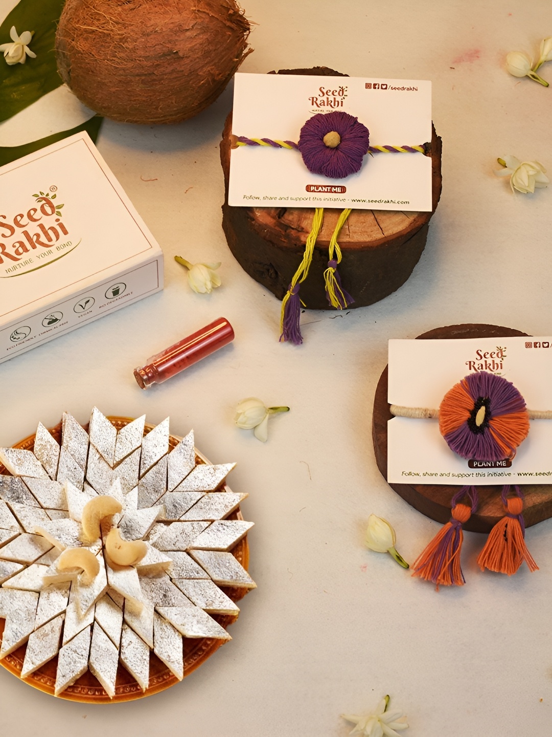 

Indigifts Set Of 3 Cotton Rakhis With Planter & Kaju Katali Box With Roli Chawal, Purple