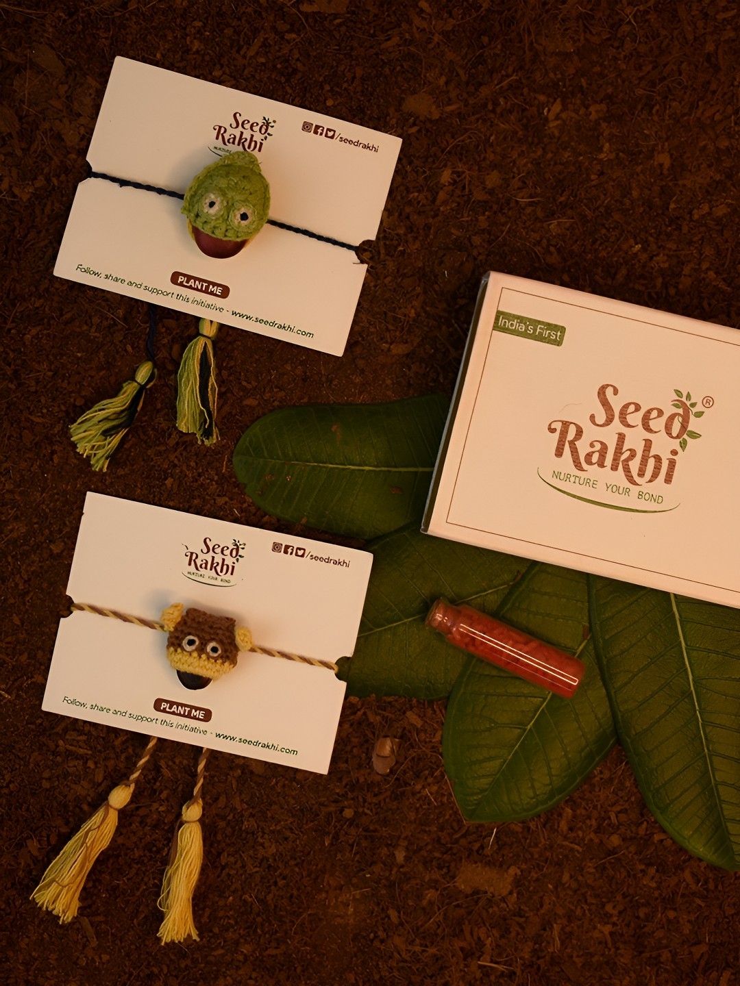 

Indigifts Set Of 2 Rakhi With Manual Instruction & Roli, Brown