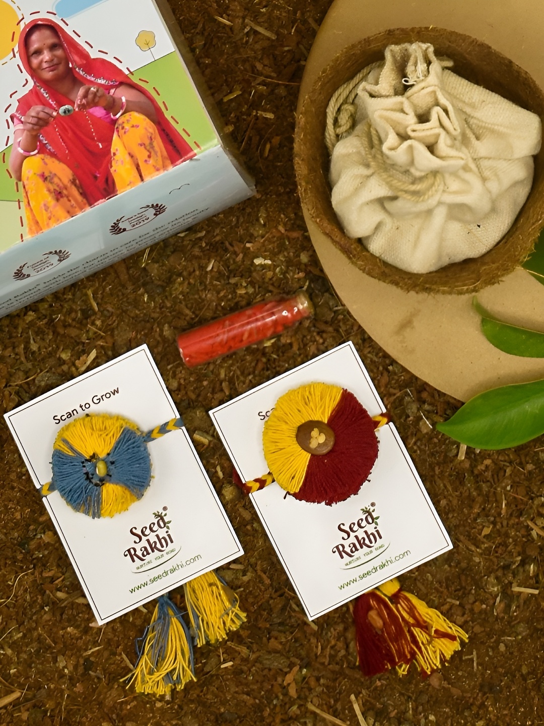 

Indigifts Set Of 2 Seed Rakhi With Planter Manual & Roli, Blue