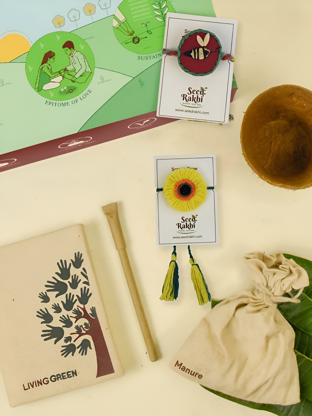 

Indigifts Set Of 2 Seed Rakhi With Planter Dairy & Pen, Brown
