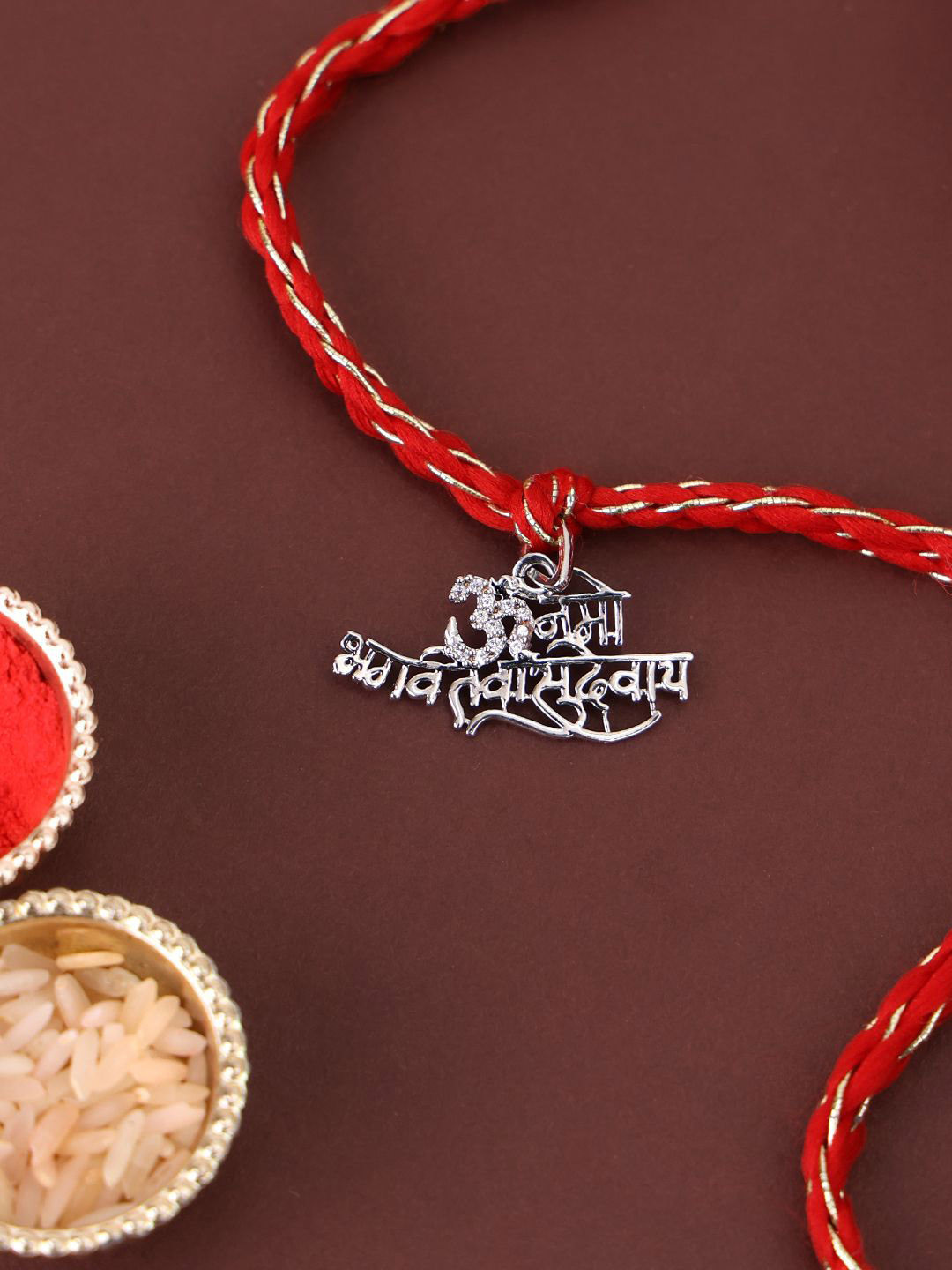 

PANASH 925 Sterling Silver-Plated Om Shaped CZ Stone Studded Rakhi With Roli Chawal