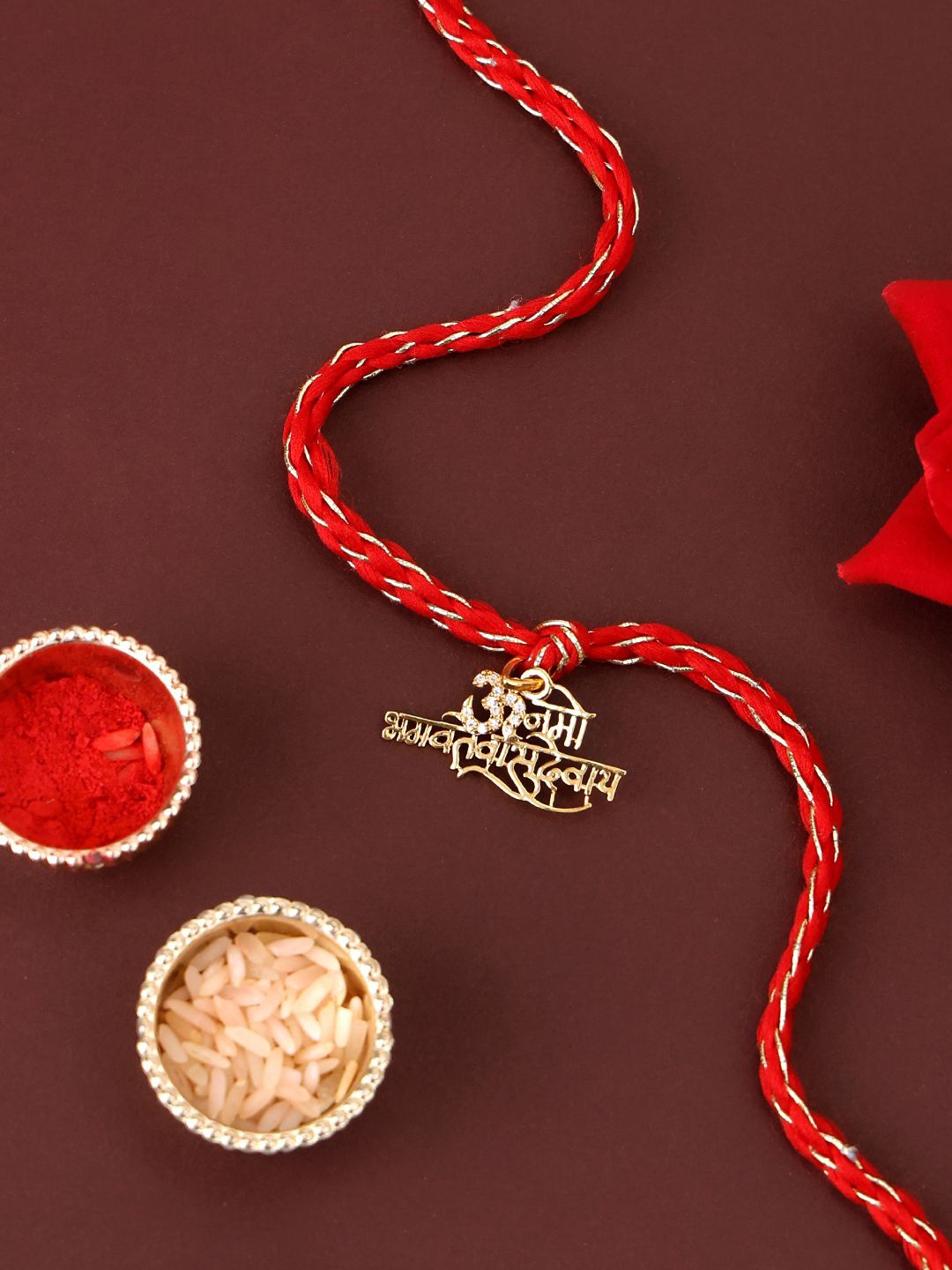 

PANASH 925 Sterling Gold-Plated Om Shaped CZ Stone Studded Rakhi With Roli Chawal