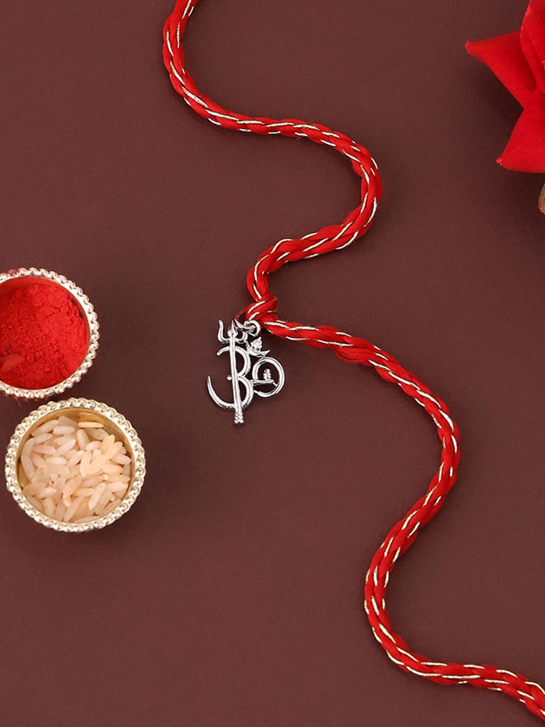 

PANASH 925 Sterling Silver -Plated Om Shaped CZ Stone Studded Rakhi With Roli Chawal