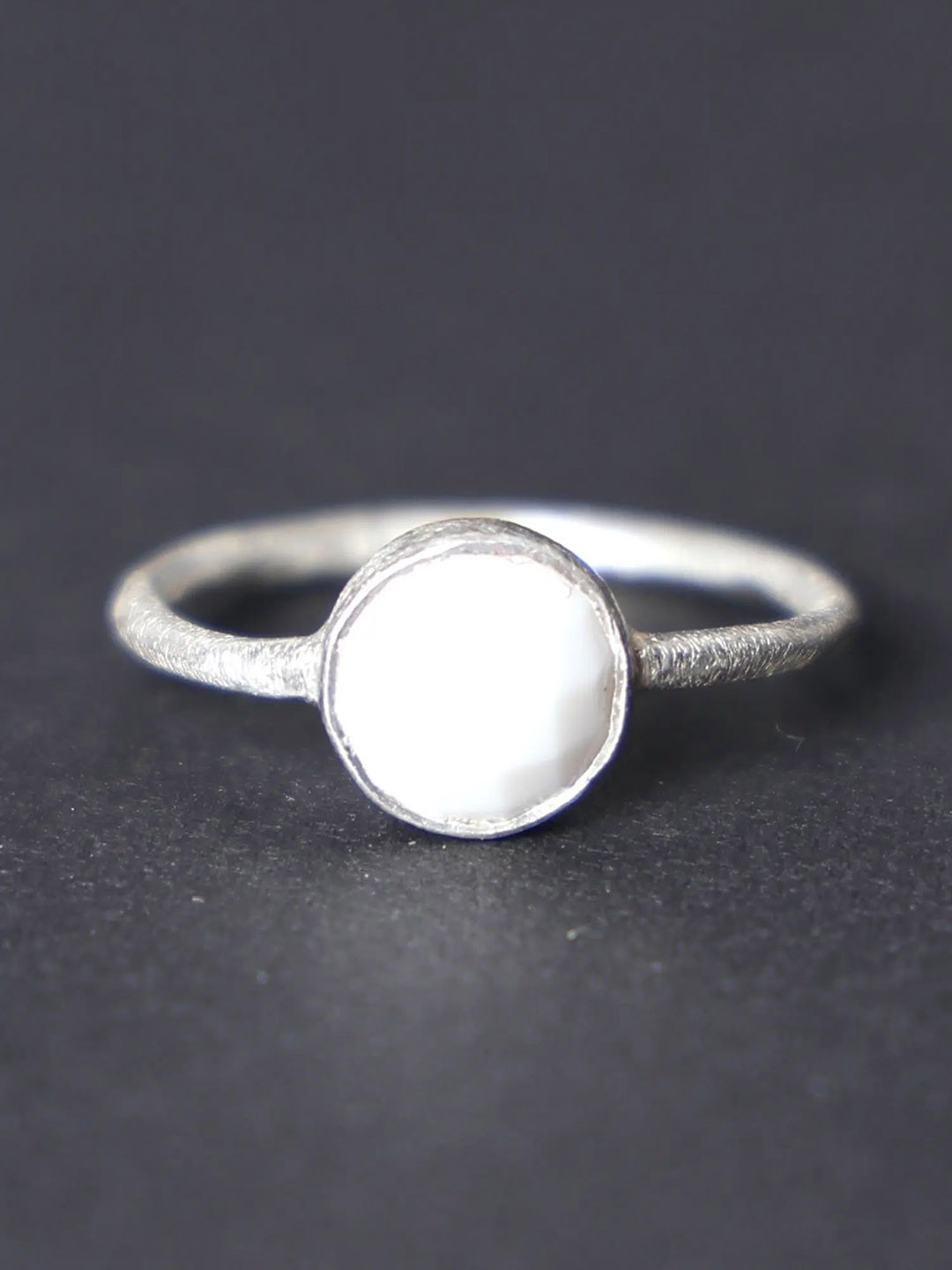 

Exotic India Sterling Silver Round Shaped Ring