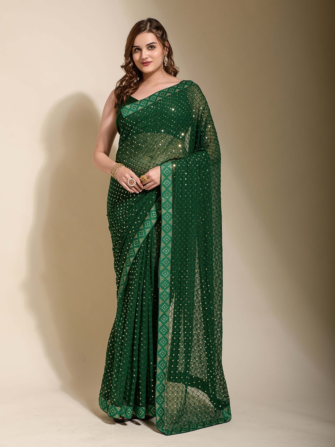 

Manu Designer Embellished Sequinned Pure Georgette Saree, Green