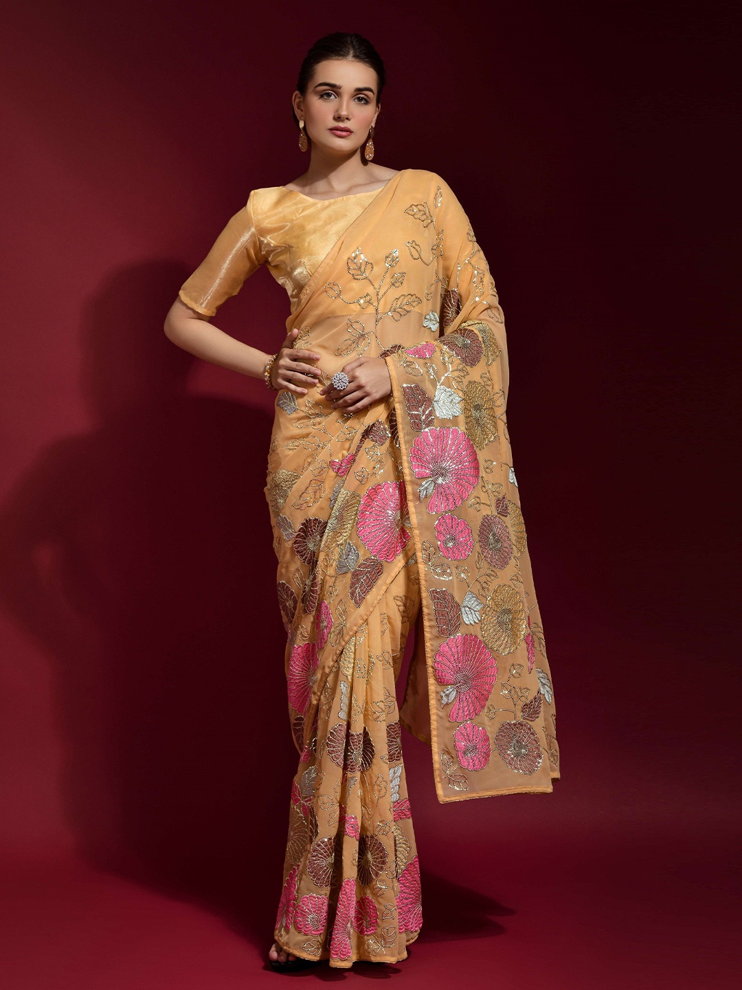 

Manu Designer Floral Embroidered Pure Georgette Saree, Yellow
