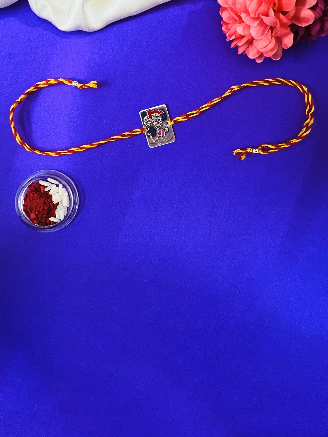 

Arte Jewels Charm Thread Rakhi With Roli Chawal, Yellow