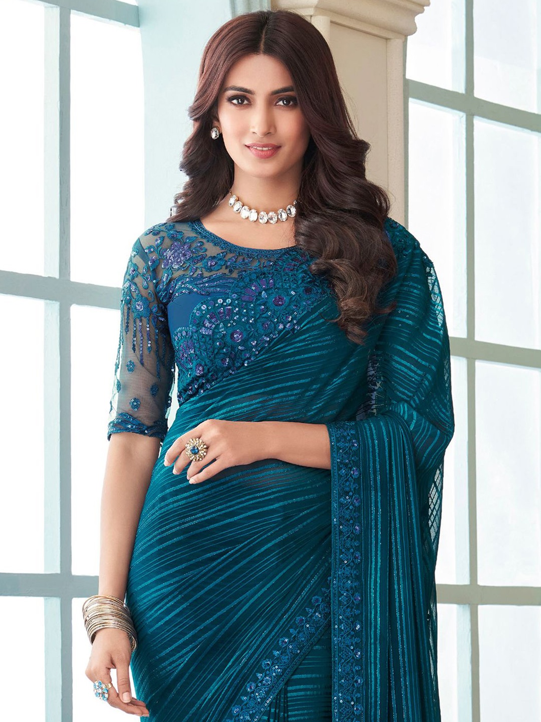 

Saree mall Striped Sequinned Poly Georgette Sarees, Teal