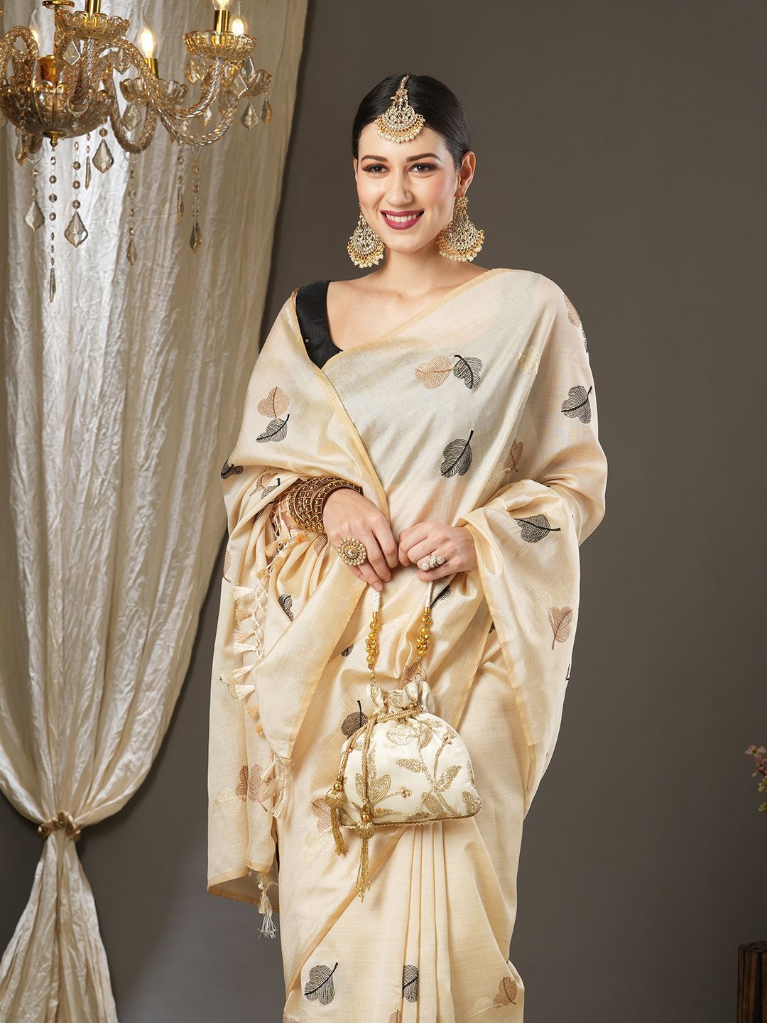 

Saree mall Ethnic Motifs Embroidered Tassel Sarees with Blouse, Cream