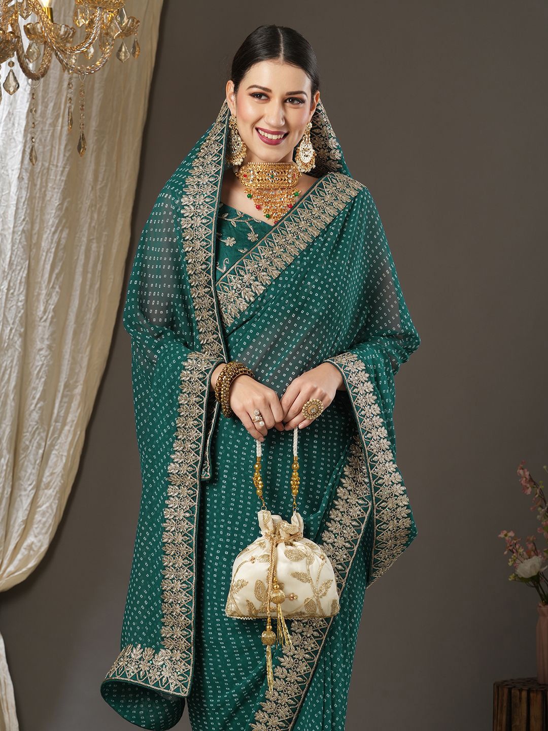 

Saree mall Bandhani Embroidered Sarees, Teal