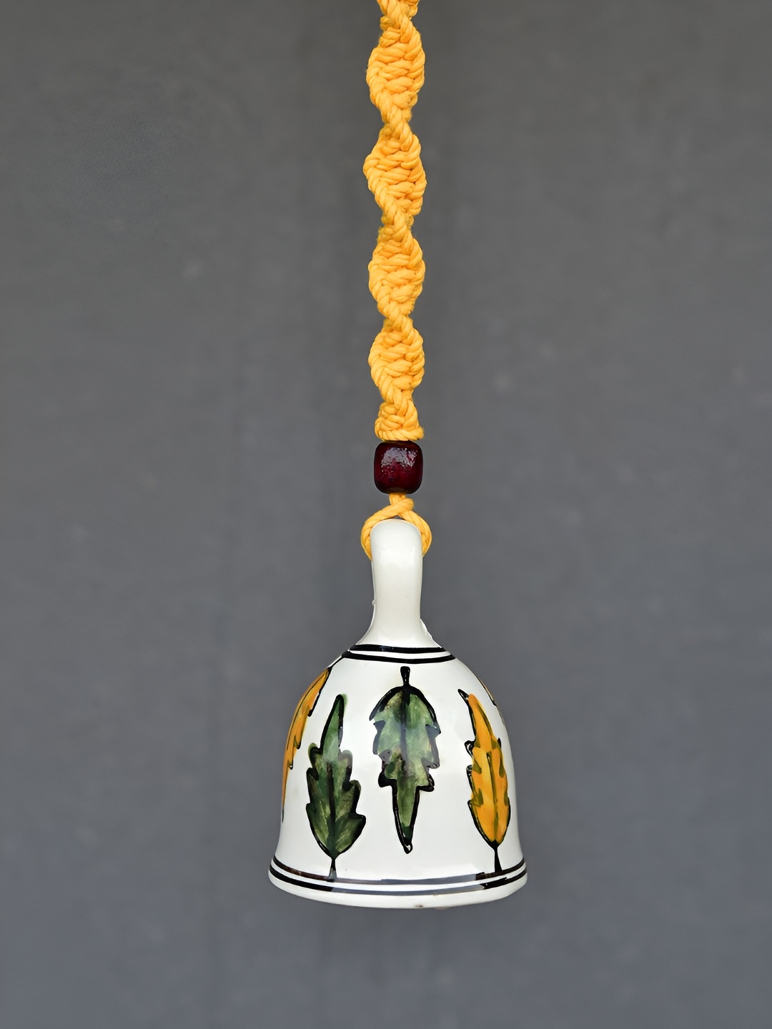 

Gathari White & Yellow Printed Bell Shaped Wall Hanging