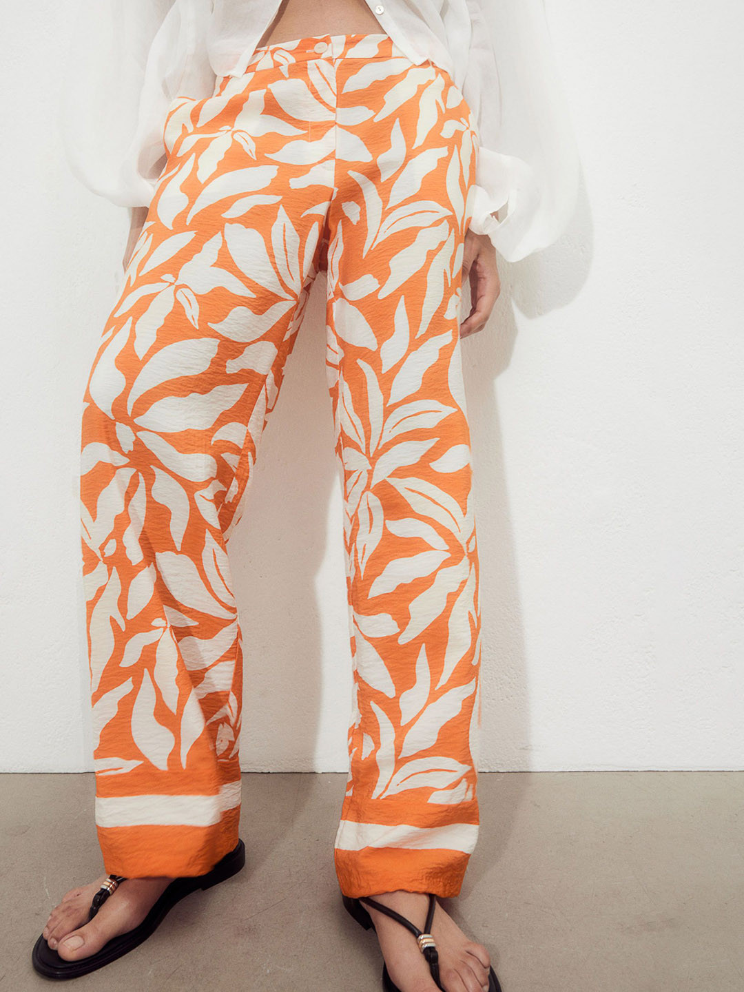 

H&M Women Printed Mid-Rise Wide Trousers, Orange