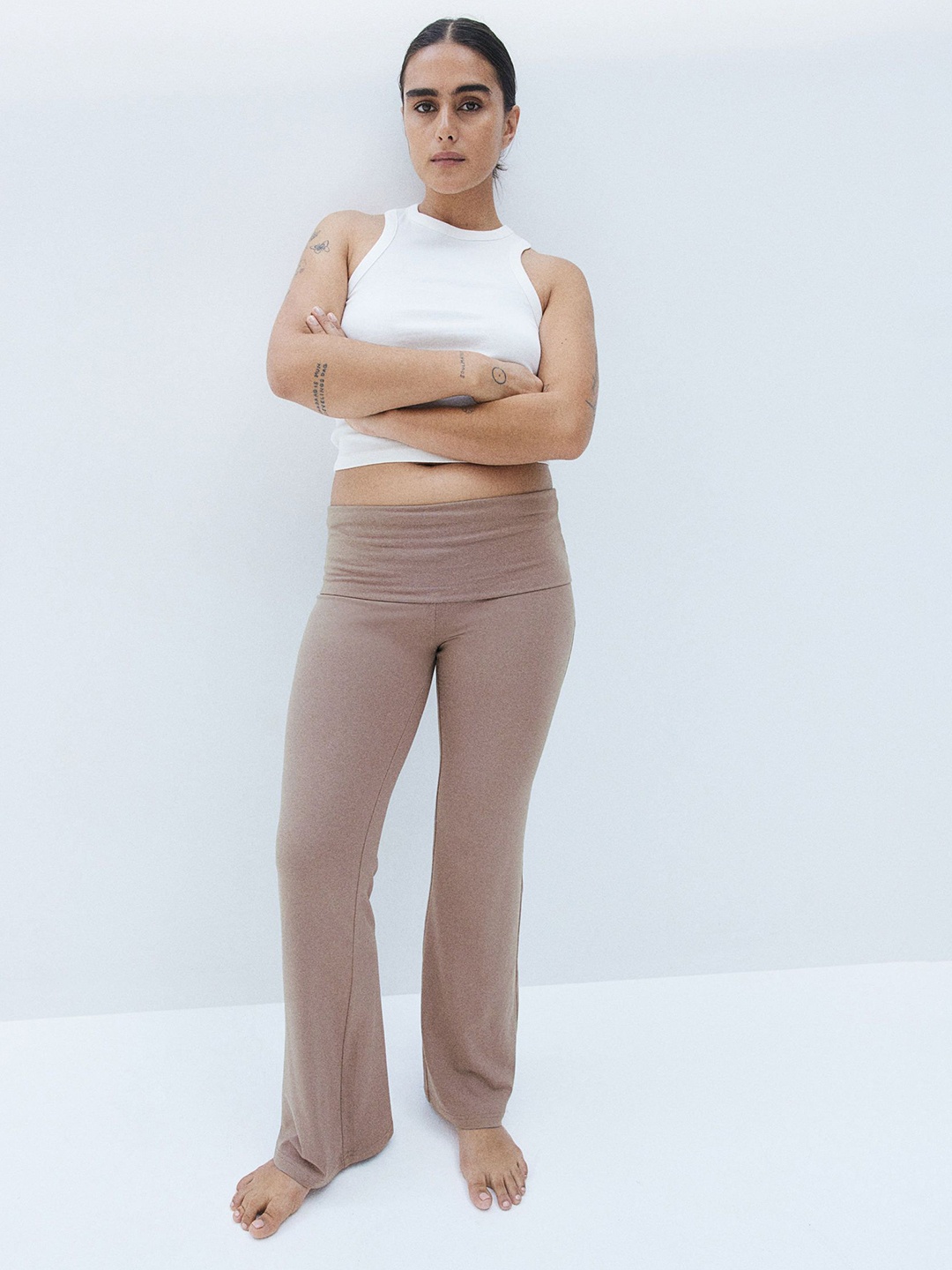 

H&M Women Mid-Rise Flared Jersey Trousers, Beige