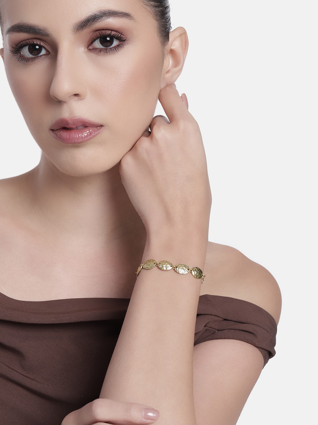 

Estele Gold Plated Stylish Rectangular Shaped Beaten Bracelet